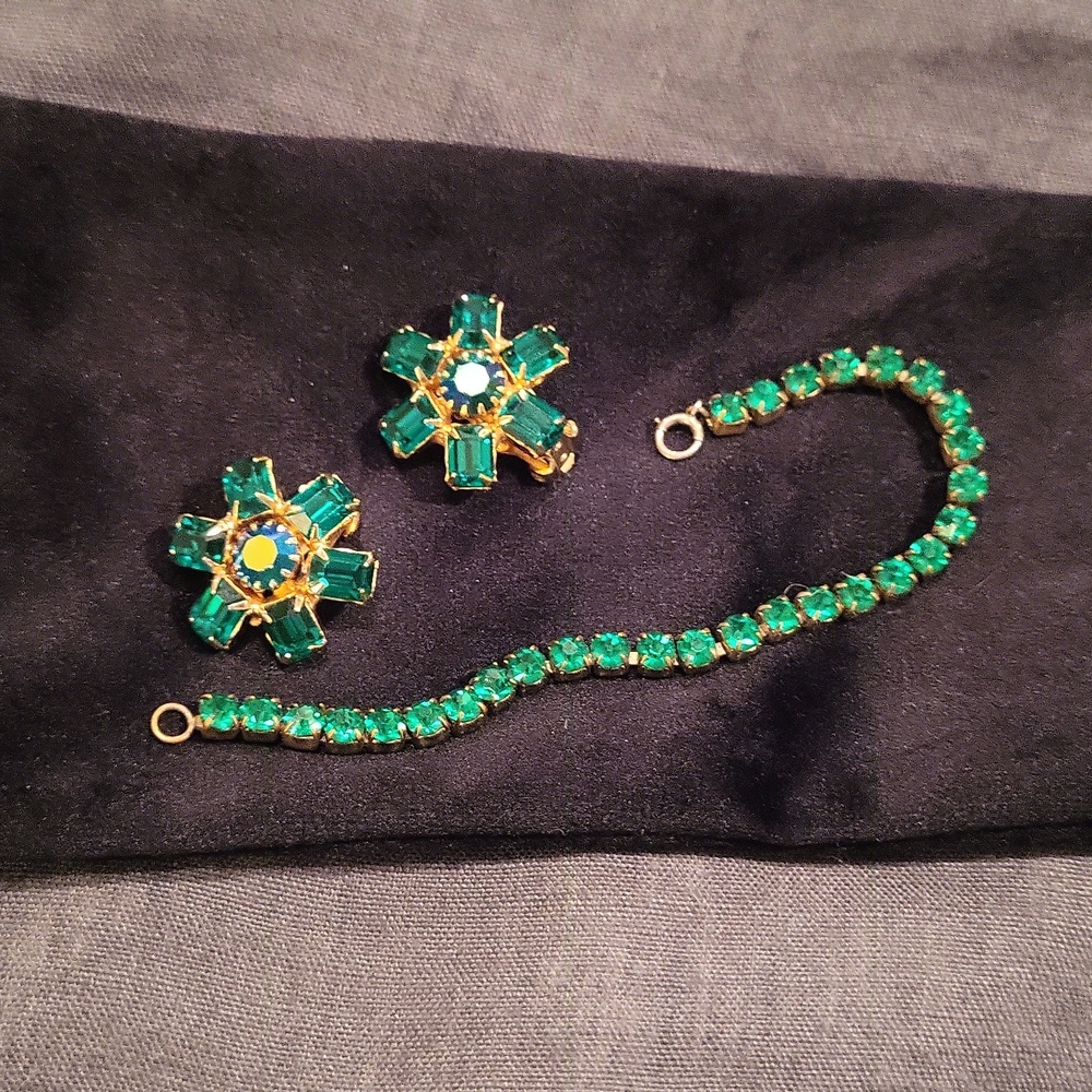 Vintage Weiss clip on earrings. Green gems. And matching tennis bracelet.